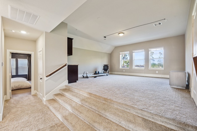 8227 Caroline Ridge Dr, Humble, TX 77396 - bonus room featuring carpet flooring, baseboards, and lofted ceiling