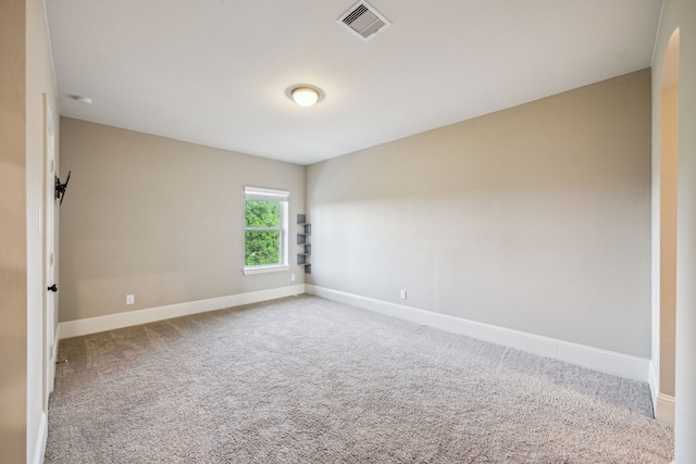 8227 Caroline Ridge Dr, Humble, TX 77396 - empty room with baseboards and carpet floors