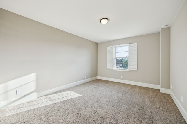 8227 Caroline Ridge Dr, Humble, TX 77396 - carpeted spare room with baseboards