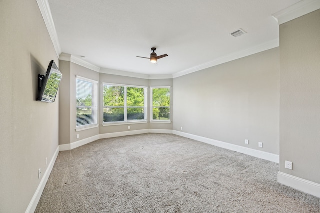 8227 Caroline Ridge Dr, Humble, TX 77396 - spare room featuring crown molding, ceiling fan, carpet flooring, and baseboards