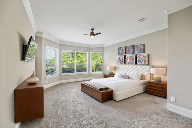 8227 Caroline Ridge Dr, Humble, TX 77396 - carpeted bedroom with crown molding, baseboards, and a ceiling fan