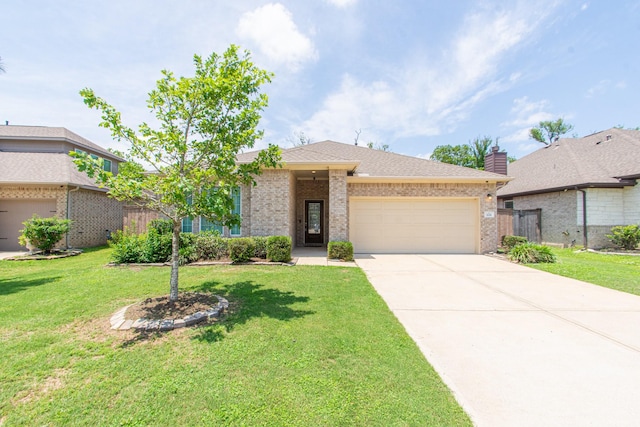 view of front of home featuring an attached garage, brick siding, concrete driveway, and a front yard