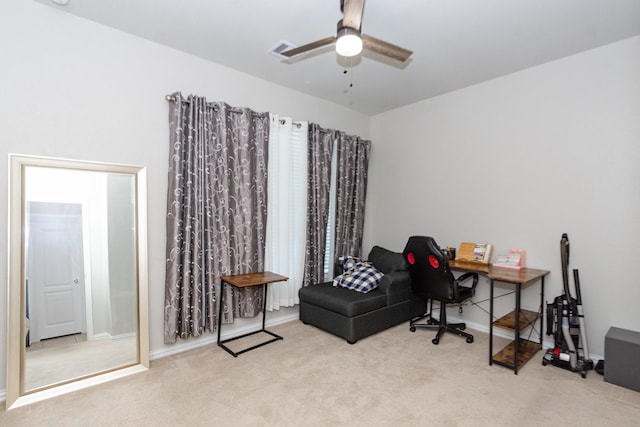 office space featuring ceiling fan, carpet floors, and baseboards