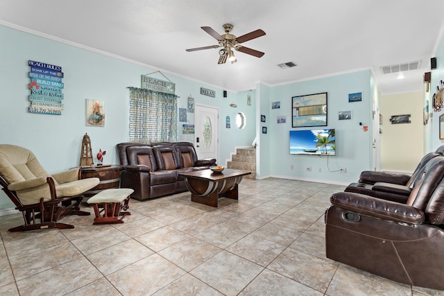 living area with crown molding, ceiling fan, visible vents, and stairway