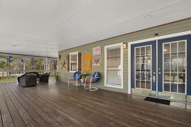 212 Woodcrest Dr, Brookeland, TX 75931 - deck featuring french doors
