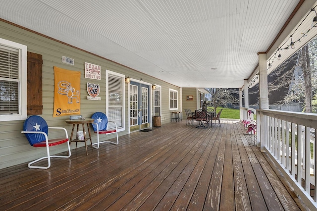 212 Woodcrest Dr, Brookeland, TX 75931 - deck featuring outdoor dining space