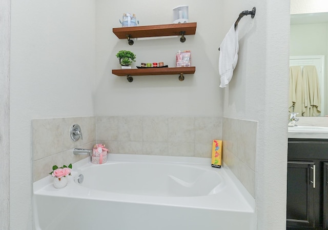21003 Iris Holly St, Katy, TX 77449 - bathroom featuring a garden tub and vanity