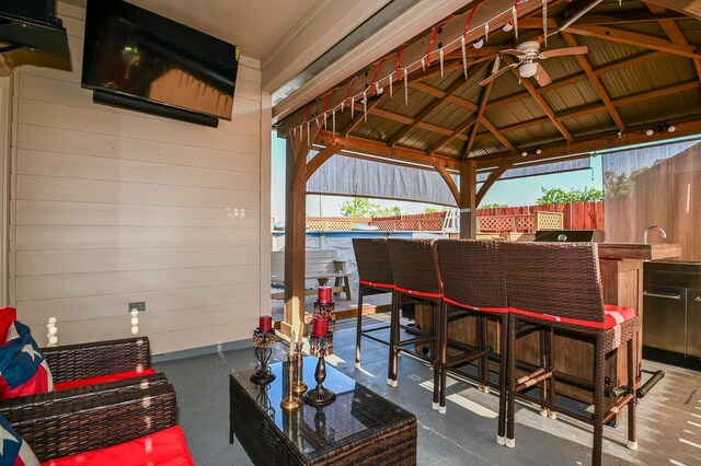 21003 Iris Holly St, Katy, TX 77449 - view of patio / terrace with a ceiling fan, outdoor dry bar, fence, and a gazebo