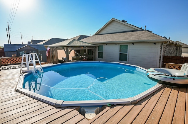 21003 Iris Holly St, Katy, TX 77449 - view of pool with a gazebo, fence, and a deck