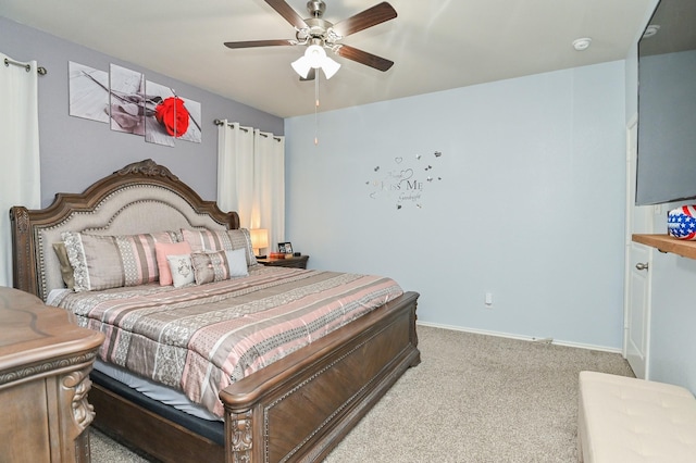 21003 Iris Holly St, Katy, TX 77449 - bedroom with light colored carpet, baseboards, and a ceiling fan