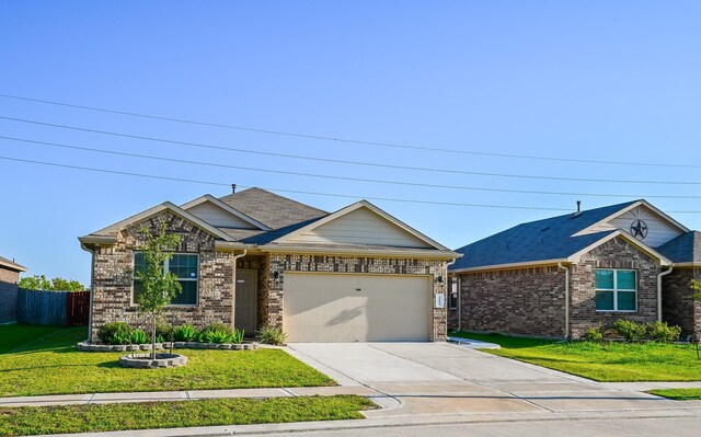 21003 Iris Holly St, Katy, TX 77449 - view of front facade with a front yard, an attached garage, fence, driveway, and roof with shingles