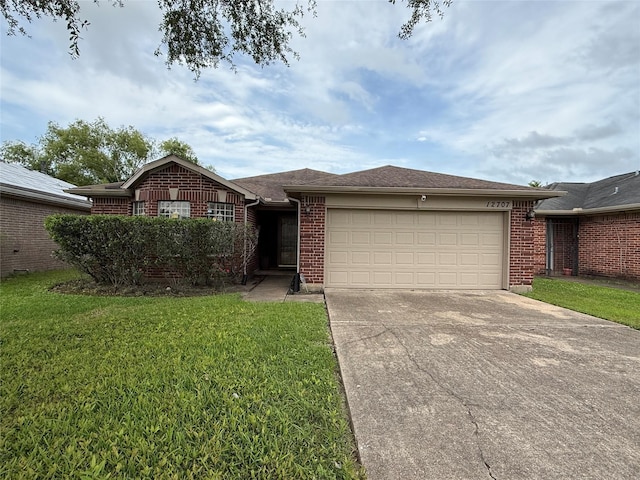 12707 Rockford Dr, Houston, TX 77048 - ranch-style house with an attached garage, driveway, brick siding, and a front lawn