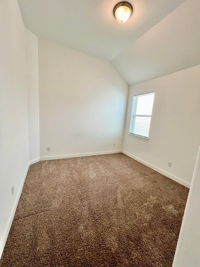 1610 Nacogdoches Valley Dr, League City, TX 77573 - carpeted spare room with baseboards and lofted ceiling