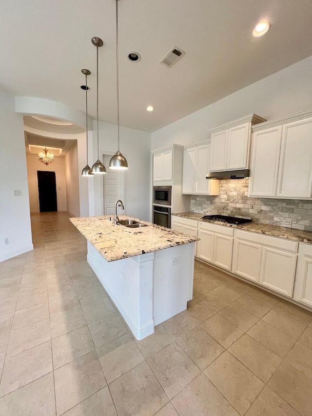 1610 Nacogdoches Valley Dr, League City, TX 77573 - kitchen featuring tasteful backsplash, light stone counters, light tile patterned flooring, a sink, and stainless steel appliances