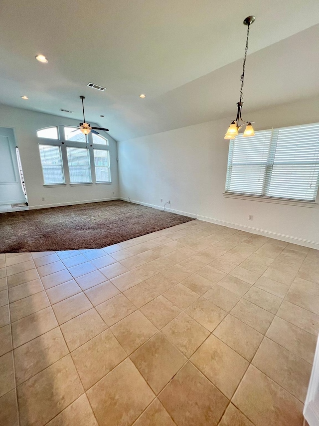 1610 Nacogdoches Valley Dr, League City, TX 77573 - unfurnished living room with baseboards, light tile patterned floors, a ceiling fan, visible vents, and lofted ceiling