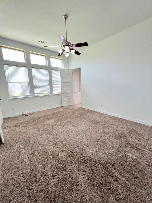 1610 Nacogdoches Valley Dr, League City, TX 77573 - carpeted spare room featuring visible vents, baseboards, and a ceiling fan