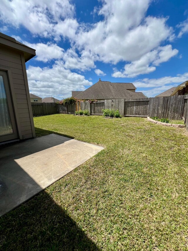 1610 Nacogdoches Valley Dr, League City, TX 77573 - view of yard with a patio area and a fenced backyard