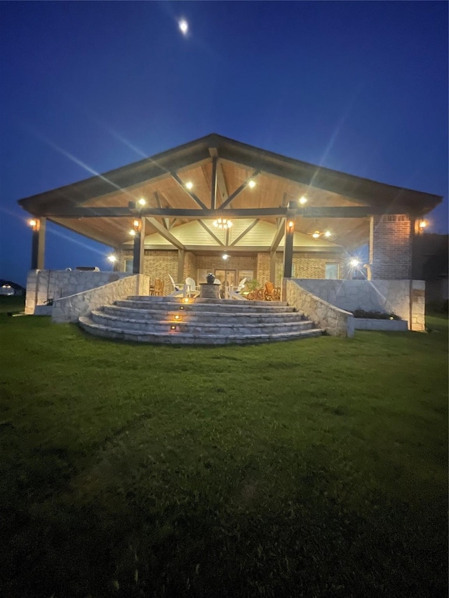 89 Grandview Blvd, Montgomery, TX 77356 - yard at night featuring a lawn