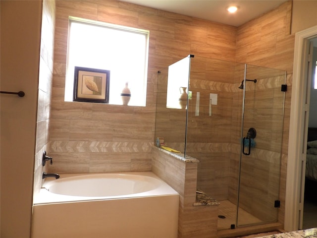 89 Grandview Blvd, Montgomery, TX 77356 - full bathroom with a stall shower and a garden tub