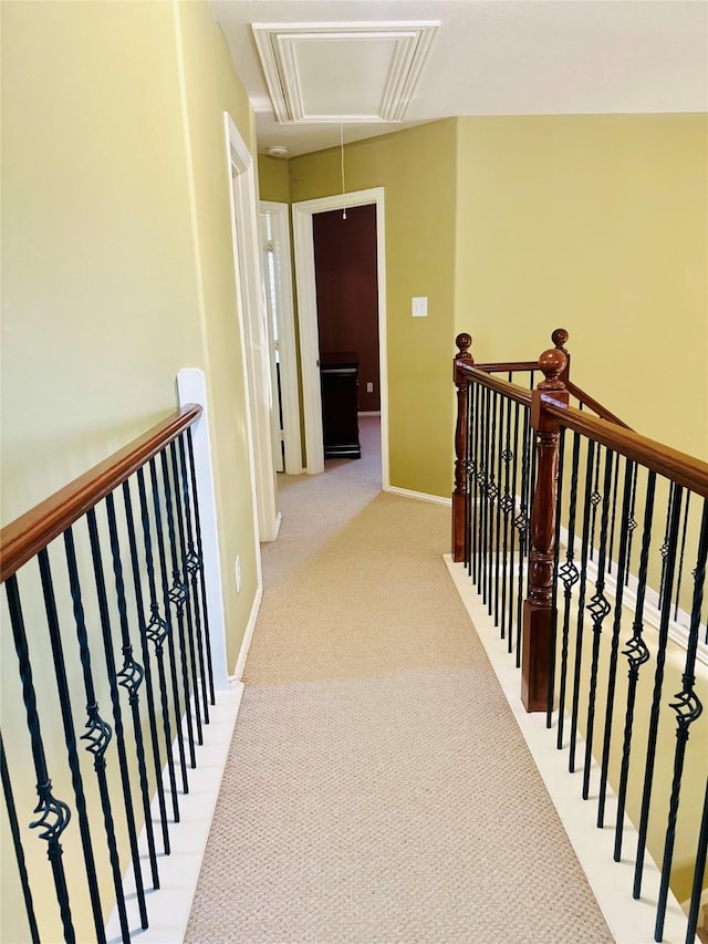 9307 Langley Springs Dr, Houston, TX 77095 - hall featuring attic access, an upstairs landing, carpet, and baseboards