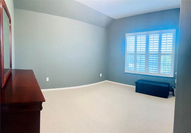 9307 Langley Springs Dr, Houston, TX 77095 - empty room with carpet flooring, baseboards, and vaulted ceiling