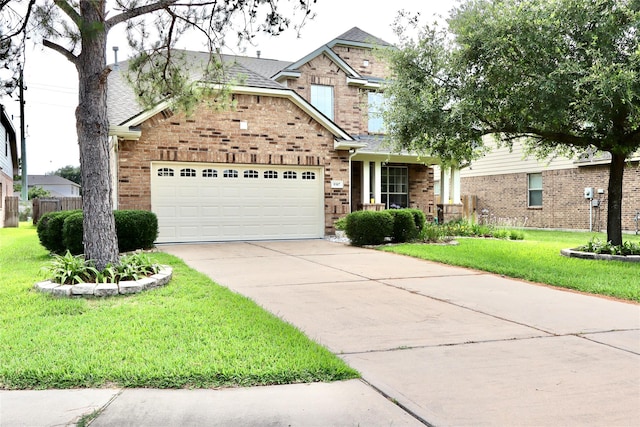 9307 Langley Springs Dr, Houston, TX 77095 - traditional home with brick siding, an attached garage, a front yard, and driveway