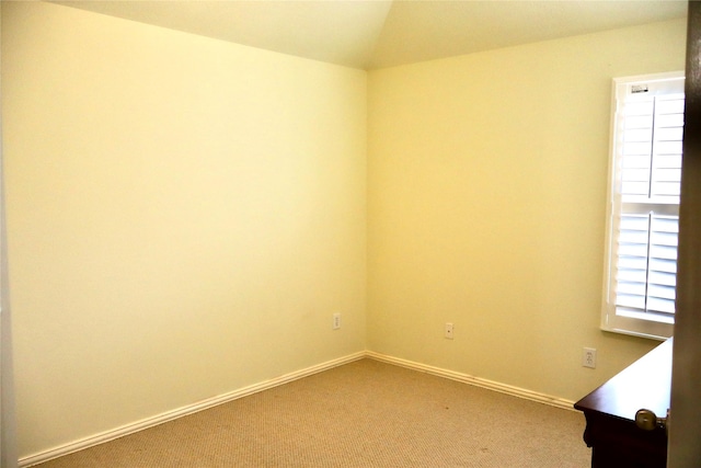 9307 Langley Springs Dr, Houston, TX 77095 - empty room featuring carpet floors, baseboards, and lofted ceiling