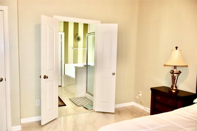 9307 Langley Springs Dr, Houston, TX 77095 - bedroom featuring baseboards and marble finish floors