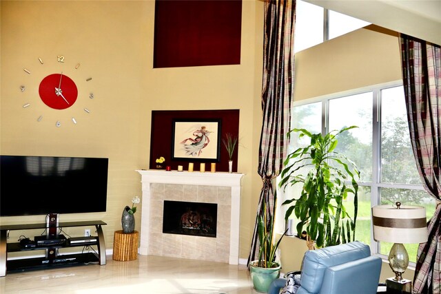 9307 Langley Springs Dr, Houston, TX 77095 - living room featuring a towering ceiling and a tiled fireplace