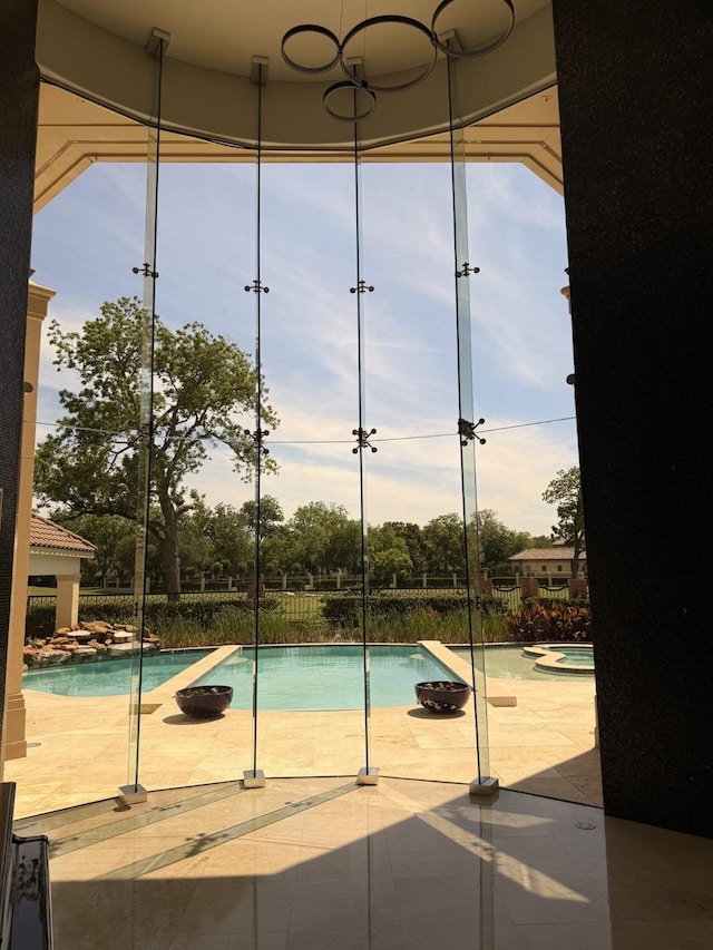 view of pool with a fenced in pool and a patio area