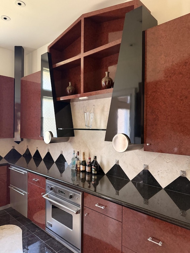 kitchen featuring oven, dark countertops, modern cabinets, and open shelves