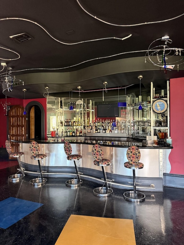 bar with a community bar and visible vents