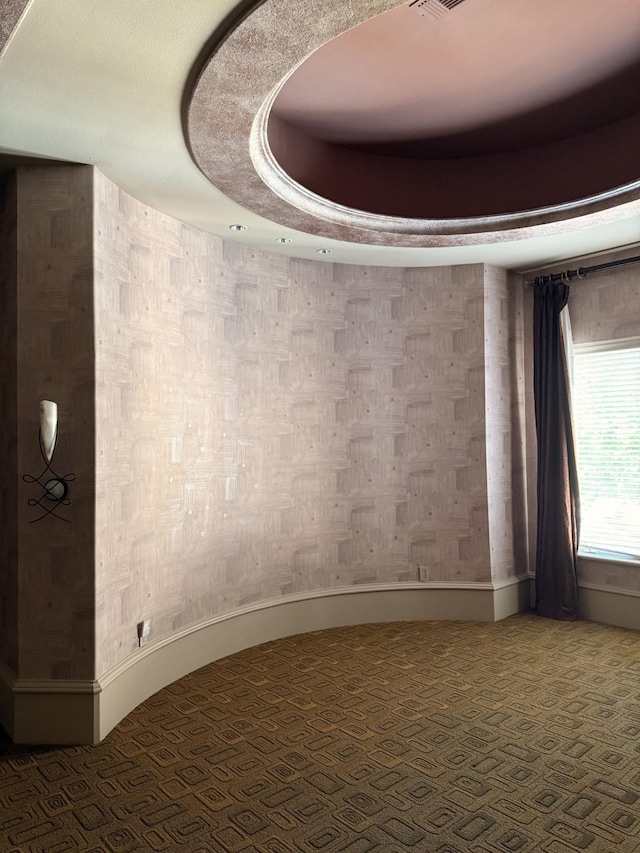empty room with carpet flooring