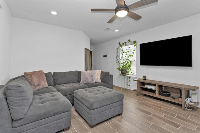 living area with visible vents, recessed lighting, a ceiling fan, and light wood-style floors