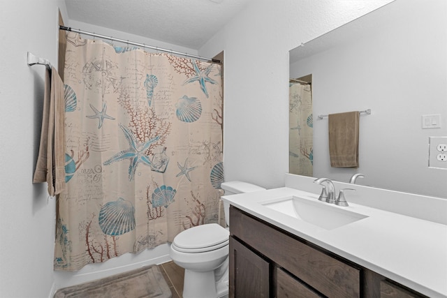 bathroom featuring toilet, a textured ceiling, vanity, and shower / bath combo with shower curtain