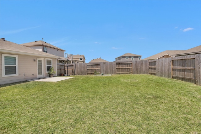 view of yard with a patio and a fenced backyard