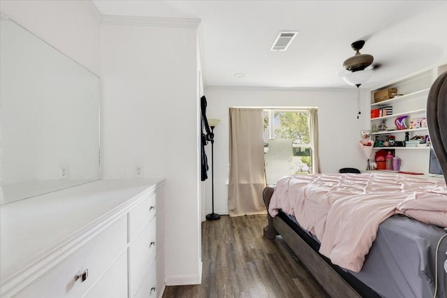 1004 Country Club Dr, Richmond, TX 77469 - bedroom with crown molding, baseboards, visible vents, and dark wood finished floors