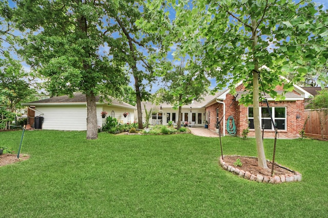 view of yard featuring a patio area and fence