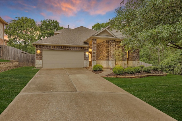 1900 Pagemill Ln, Conroe, TX 77304 - view of front of house with brick siding, a garage, roof with shingles, and concrete driveway