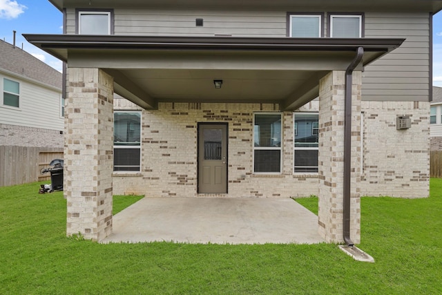 21406 Tropisea Dr, Cypress, TX 77433 - exterior space featuring a yard, brick siding, a patio area, and fence