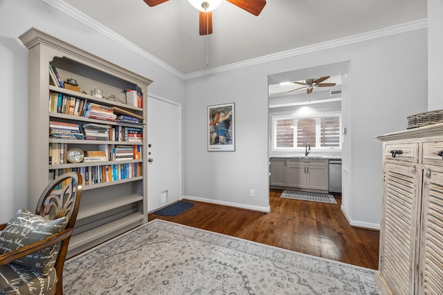 office with dark wood-style flooring, ceiling fan, baseboards, and a sink