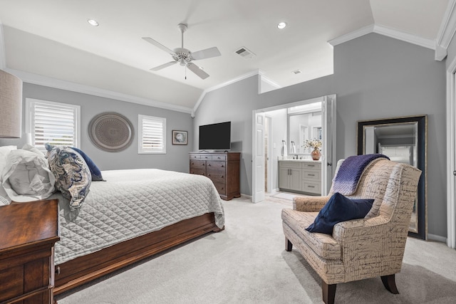 bedroom with visible vents, light colored carpet, crown molding, and vaulted ceiling