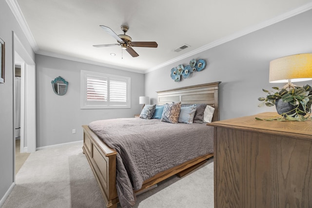 bedroom featuring baseboards, visible vents, ornamental molding, and light carpet