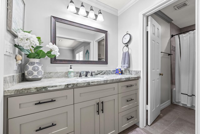 bathroom with crown molding, a shower with curtain, visible vents, and vanity
