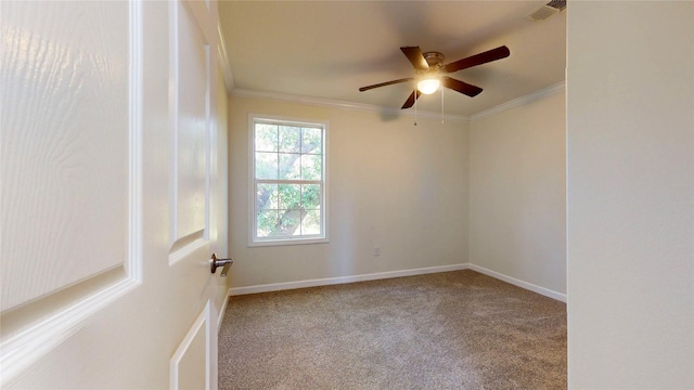 carpeted empty room with crown molding, visible vents, baseboards, and a ceiling fan