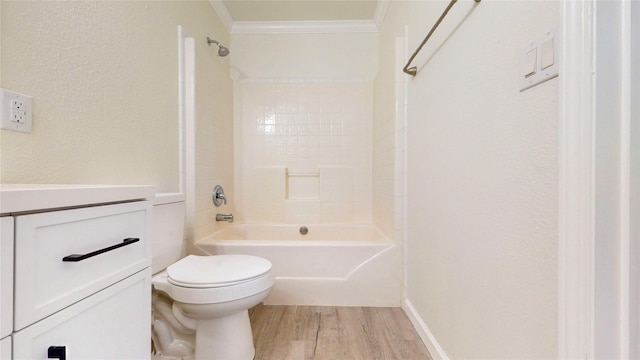full bath featuring bathtub / shower combination, crown molding, toilet, and wood finished floors