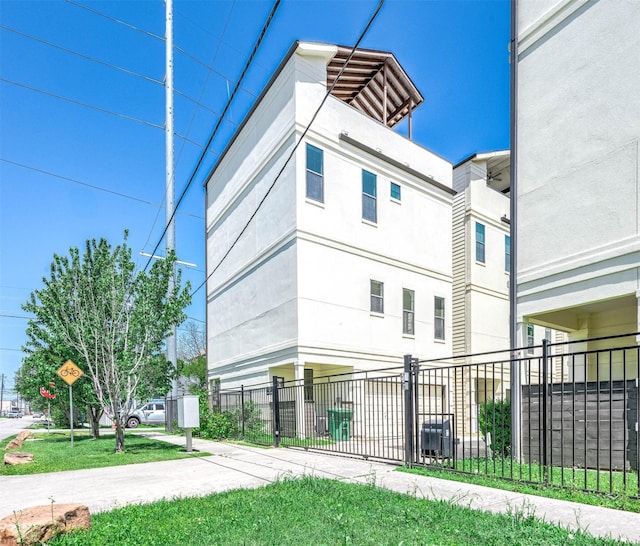view of property featuring fence