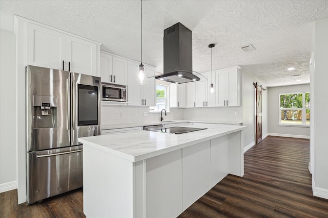 kitchen featuring island exhaust hood, baseboards, white cabinets, and stainless steel appliances