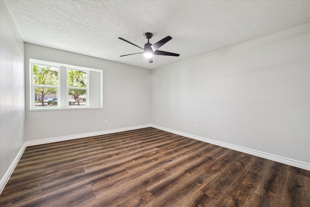 unfurnished room with a ceiling fan, a textured ceiling, baseboards, and dark wood-style floors