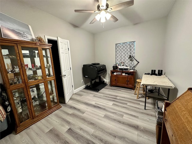 office space featuring light wood-style flooring and ceiling fan